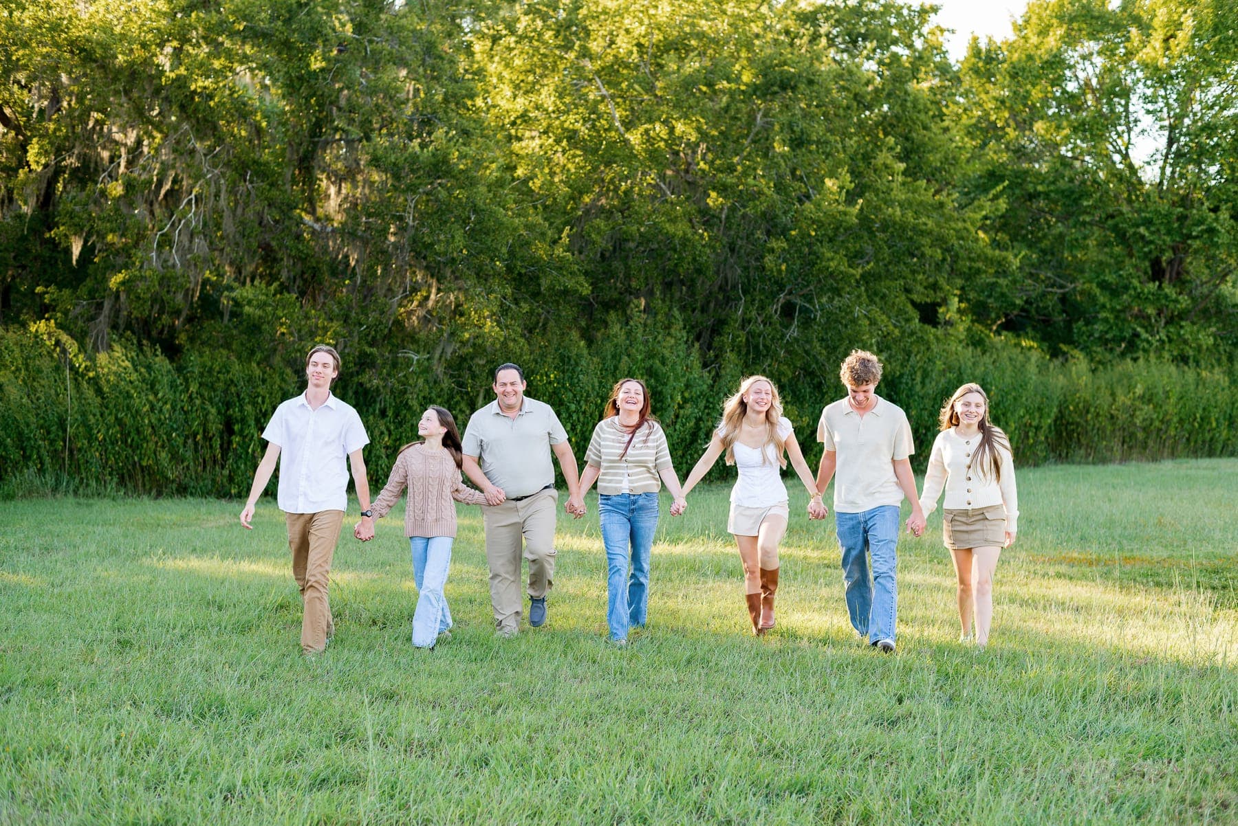 The Gerhardt family walking together — the family behind Bluebonnet Exteriors HTX