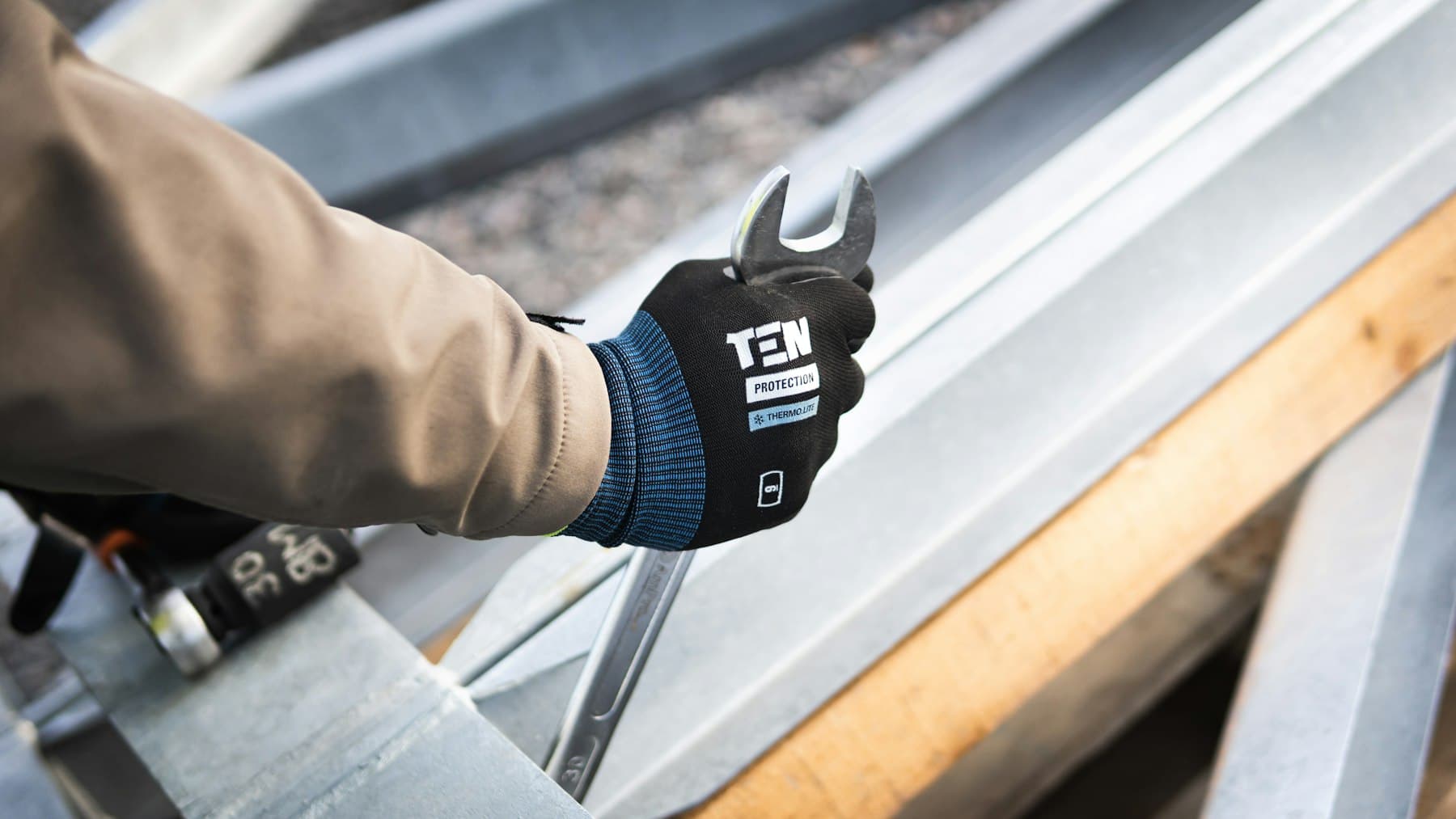 Bluebonnet installer measuring a window opening